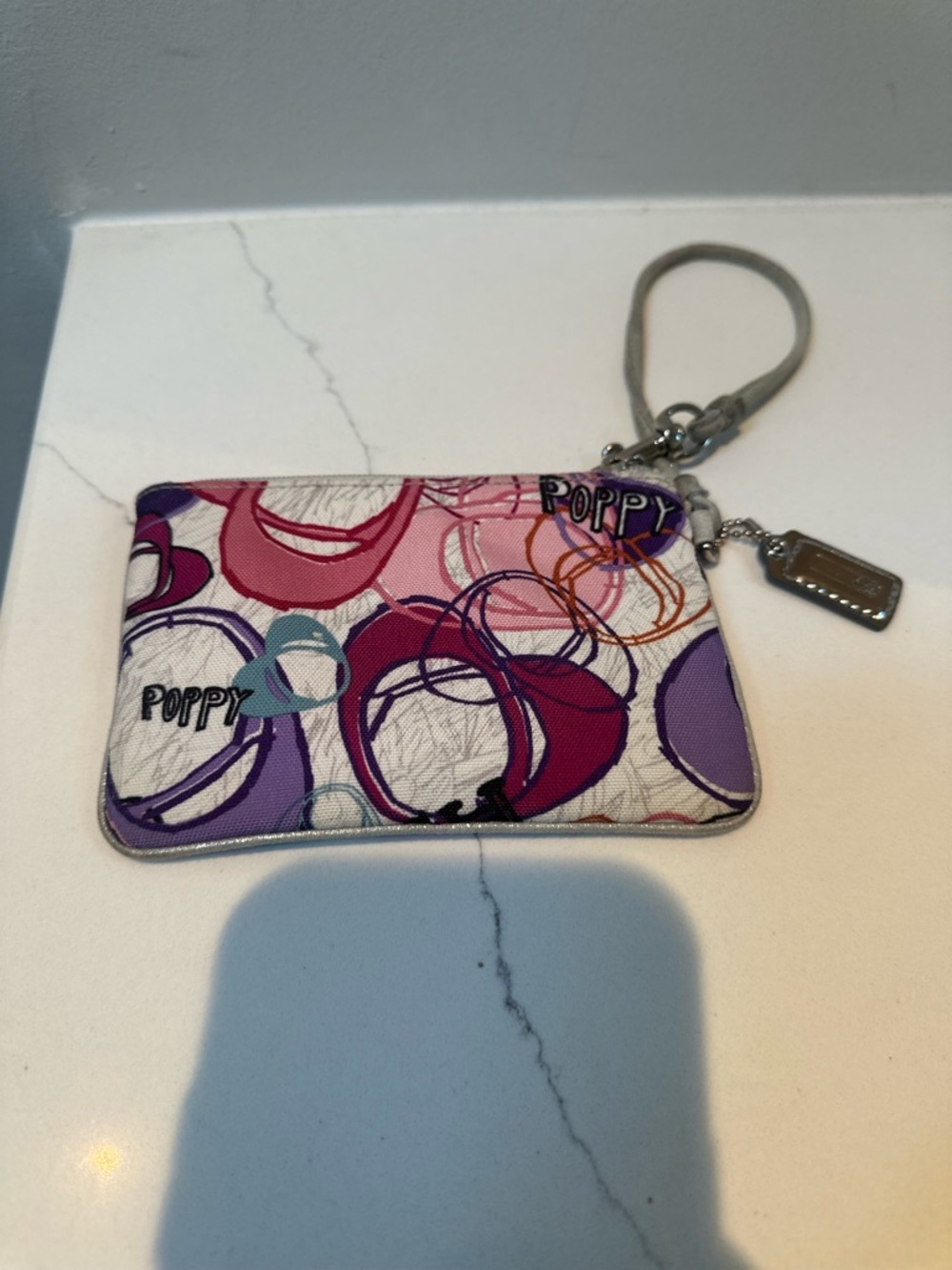 Coach Poppy Y2K  wristlet in Pink & Purple